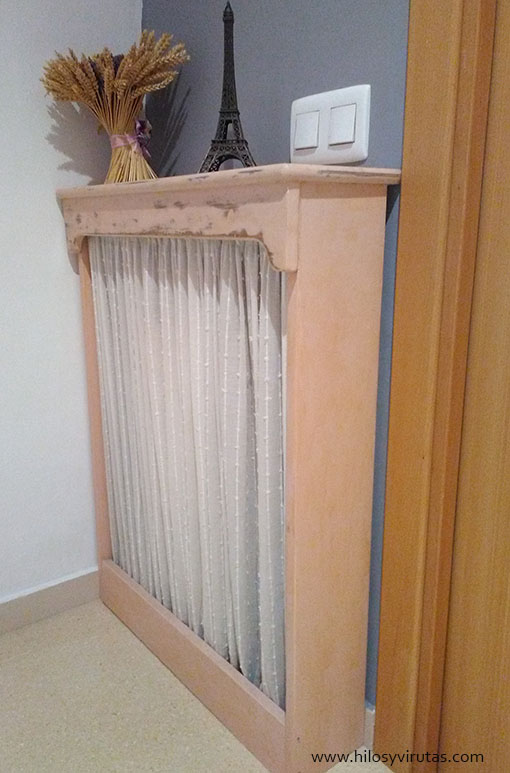 cubreradiador rosa con visillo