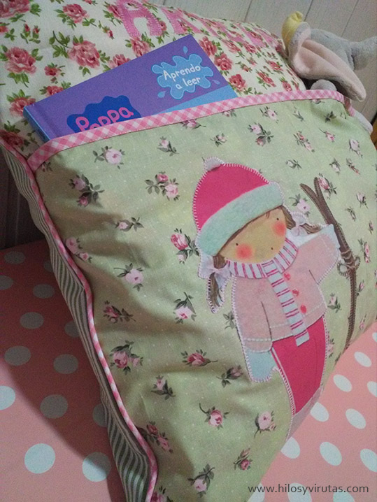 cojin bolsillos esquiadora rosa
