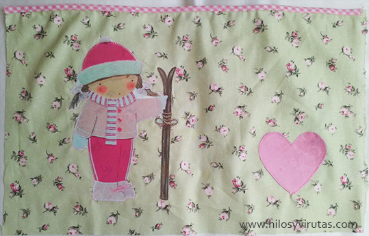 muñeca esquiadora rosa