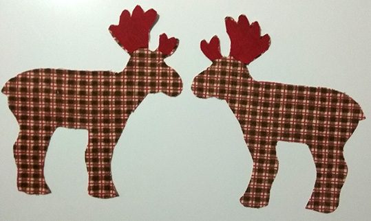 Reno tela cuernos rojos